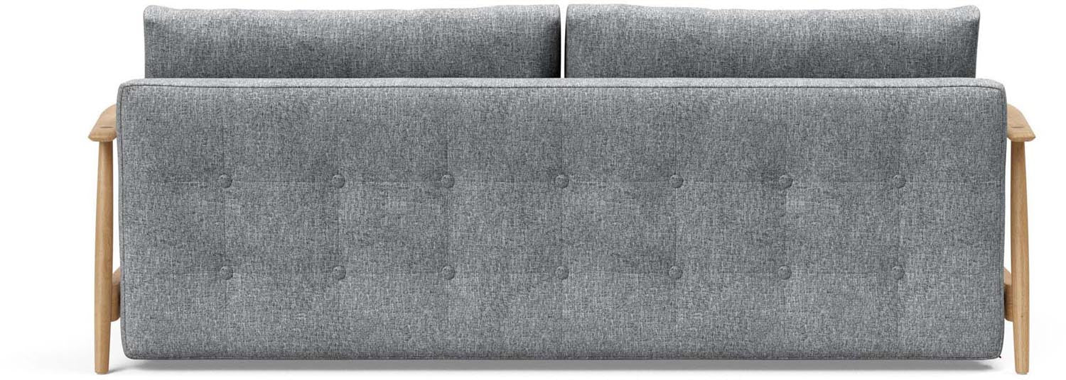 Das Eluma Bettsofa 140 von Innovation Living vereint modernes Design mit praktischer Funktionalität, ideal für kleine Räume und Übernachtungsgäste.