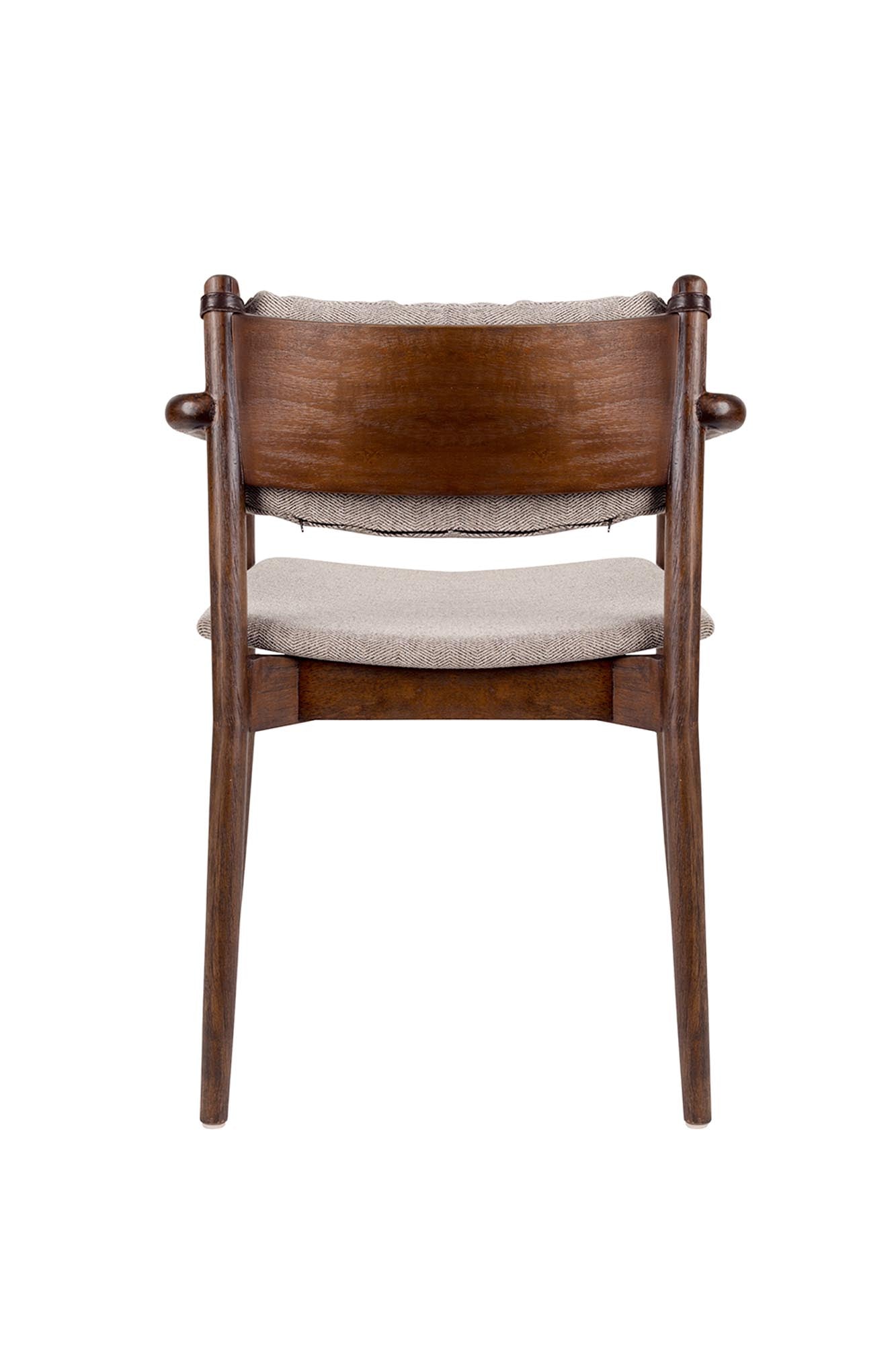 Entdecken Sie den Armlehnstuhl Torrance von Dutchbone – eine perfekte Kombination aus Eleganz und Bequemlichkeit für Ihr Zuhause.