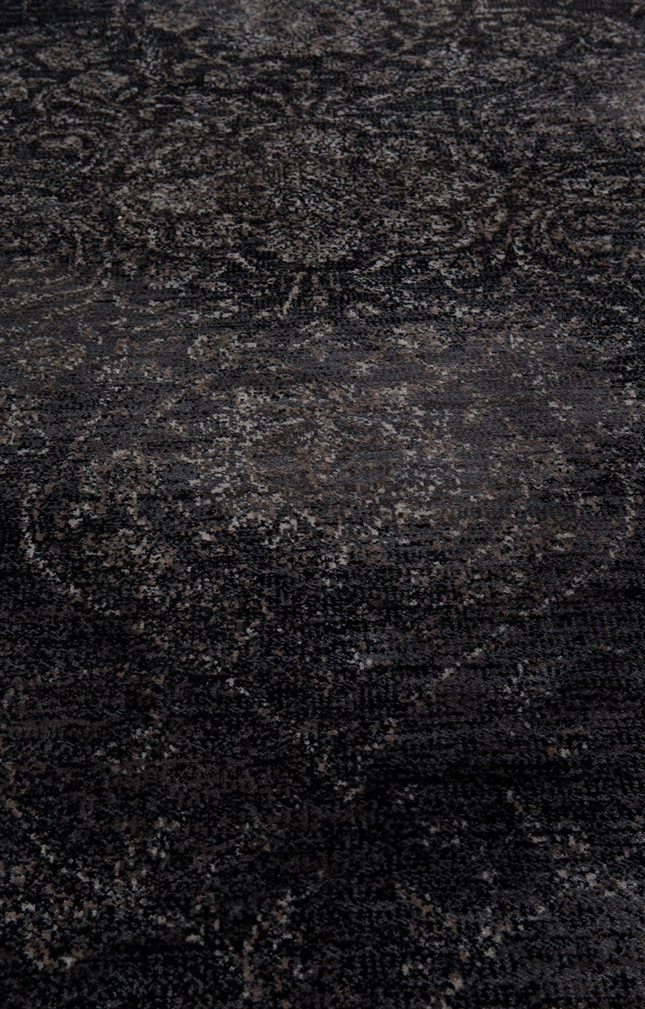 Der Dutchbone Rugged Teppich vereint Vintage-Charme mit Qualität, ideal für elegante und gemütliche Wohnräume.