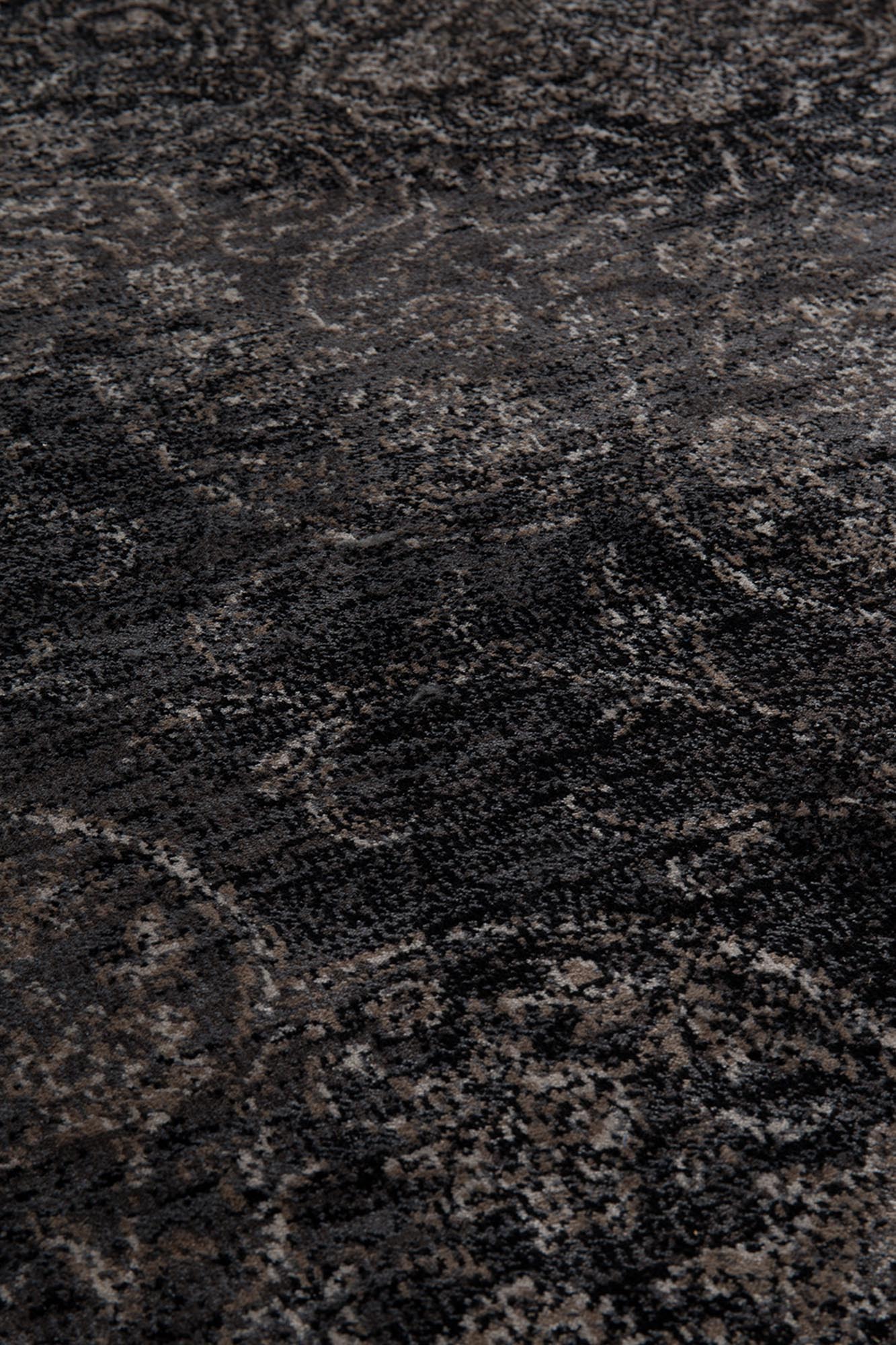 Der Rugged Teppich von Dutchbone besticht durch seinen Vintage-Look und hochwertige Verarbeitung für stilvolle Räume.