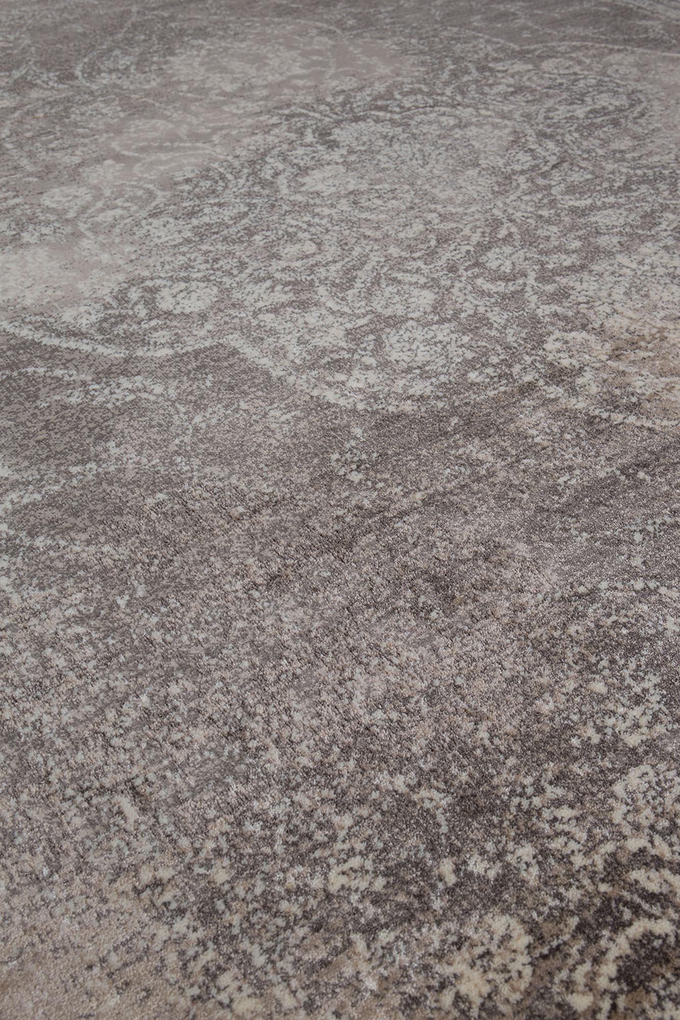 Der Dutchbone Rugged Teppich vereint Vintage-Charme mit Qualität, ideal für elegante und gemütliche Wohnräume.