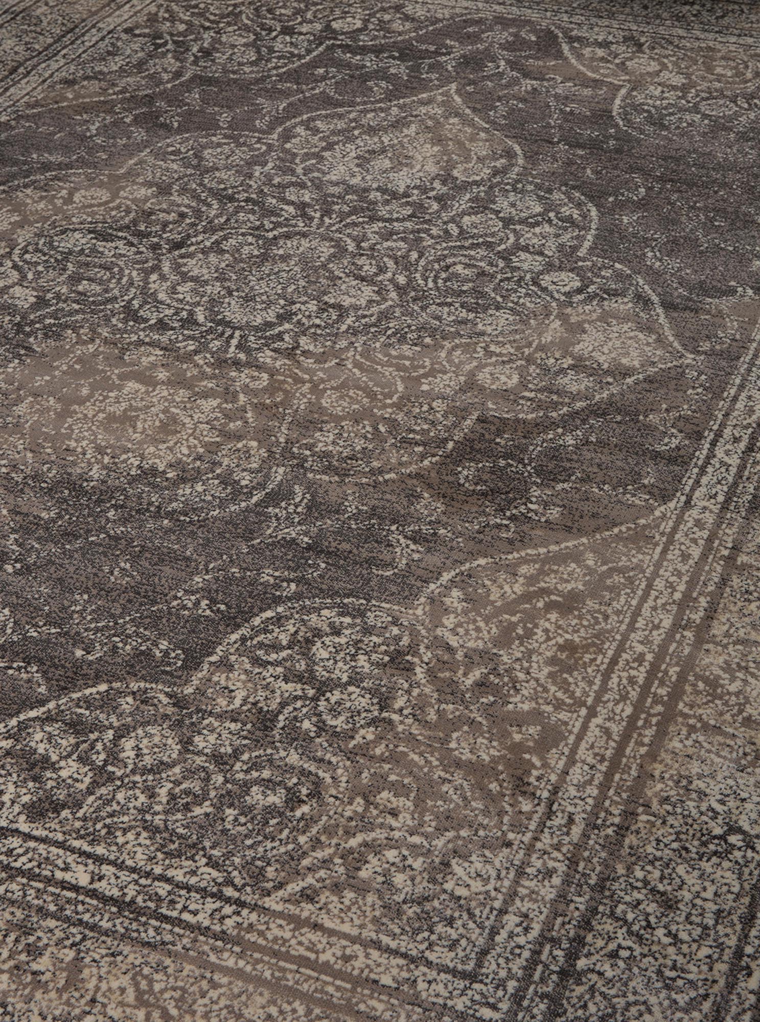 Der Dutchbone Rugged Teppich vereint Vintage-Charme mit Qualität, ideal für elegante und gemütliche Wohnräume.