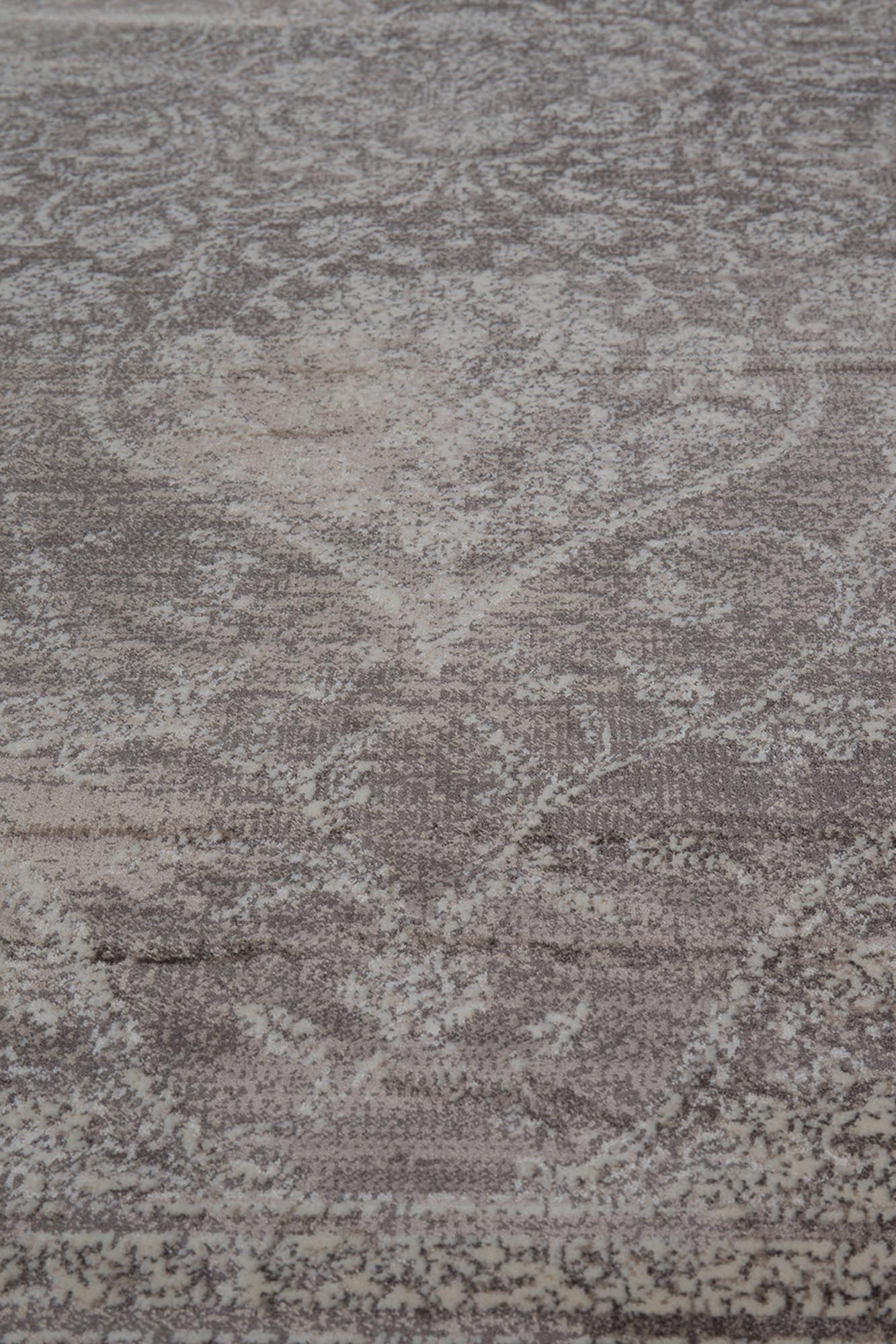 Der Rugged Teppich von Dutchbone besticht durch seinen Vintage-Look und hochwertige Verarbeitung für stilvolle Räume.