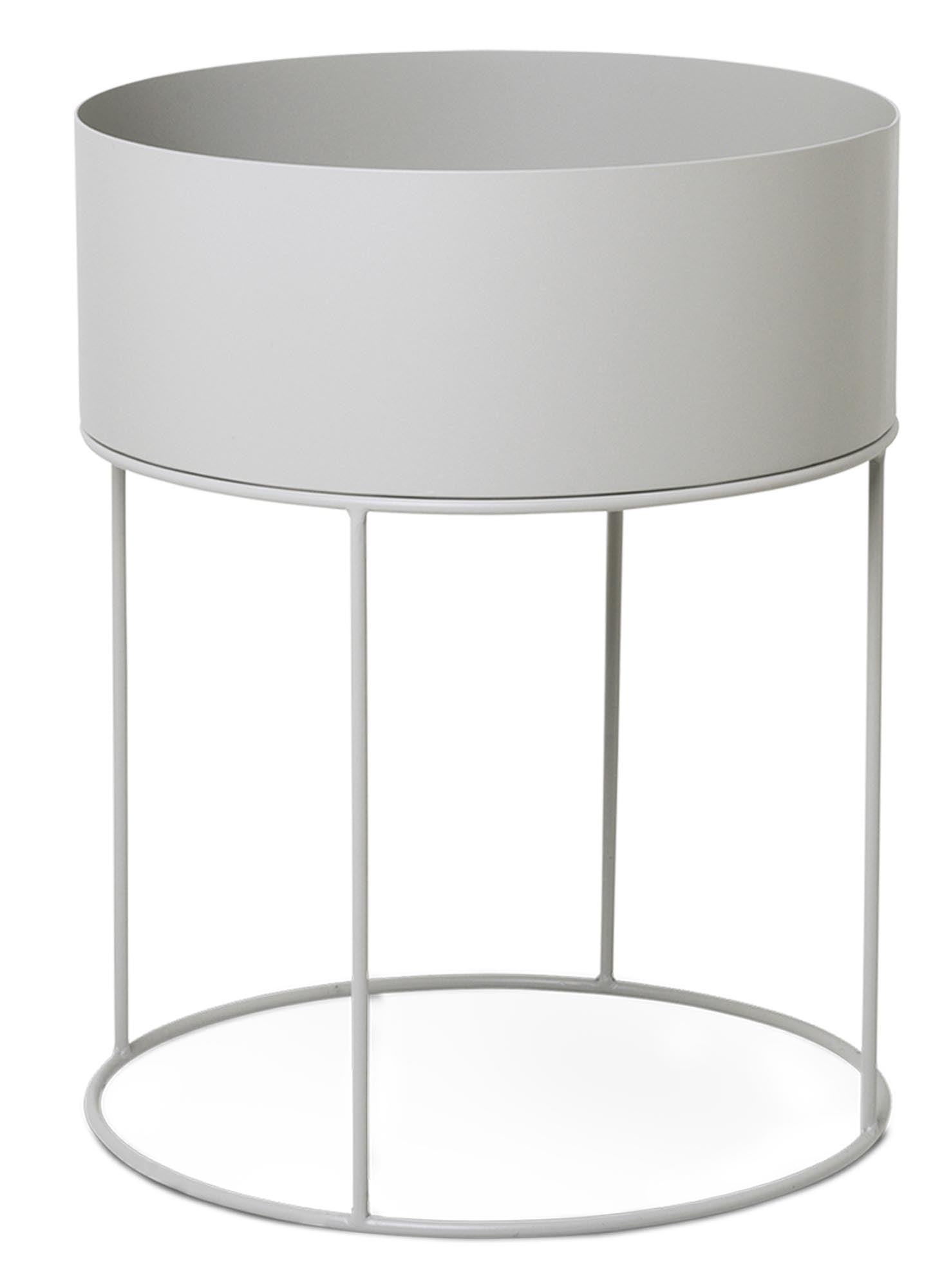 Elegante runde Plant Box von Ferm Living für stilvolle Raumgestaltung.