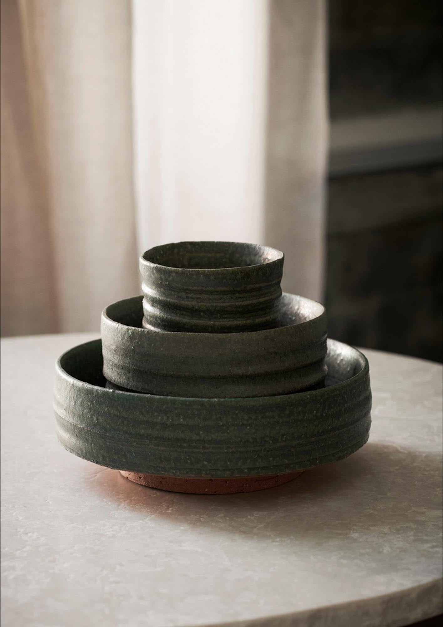Elegante Serena Schüssel von Ferm Living in sanftem Grün, Ø12.5 cm, ideal für stilvolle Tischdekoration und vielseitige Verwendung.