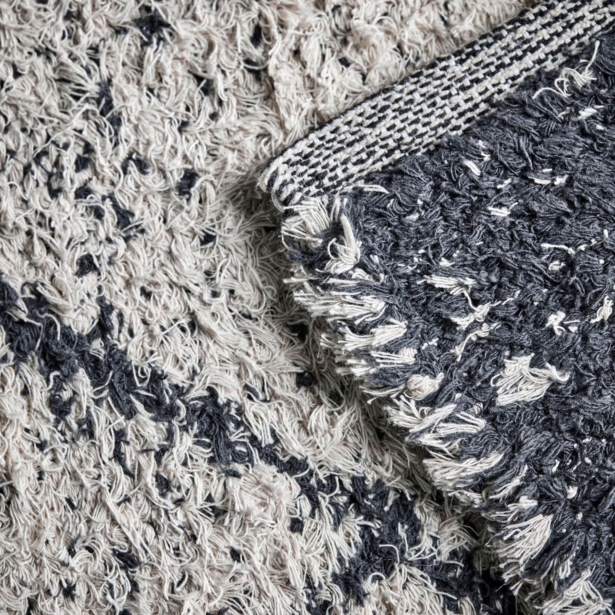 Moderner HDCruz Teppich von House Doctor in stilvollem Creme-Grau.