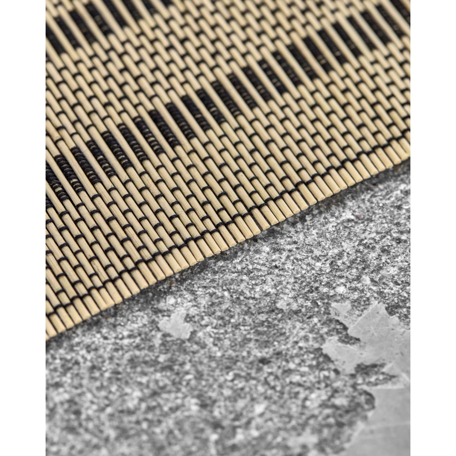 Stilvolles Tischset von House Doctor in Schwarz und Natur, perfekt für moderne und elegante Tischdekorationen.