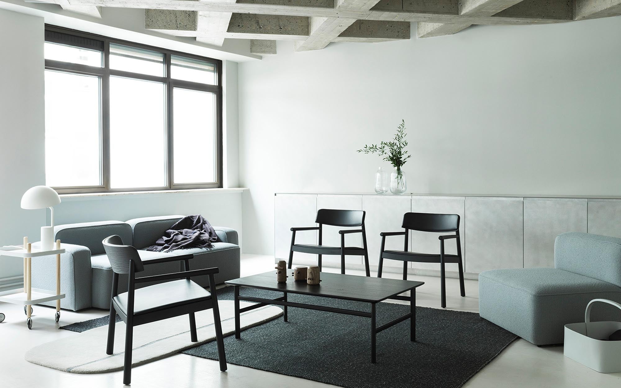 Timb Sessel von Normann Copenhagen: Elegante Linien und hochwertige Materialien vereinen sich in diesem skandinavischen Möbelstück.