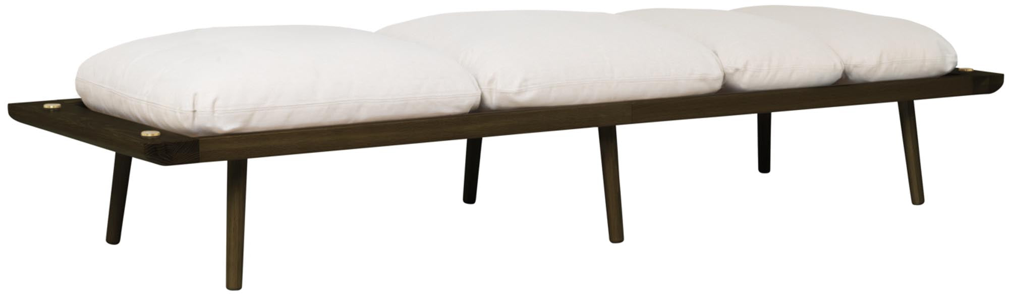 Stylisches Lounge Daybed von Umage, perfekt für gemütliche Stunden. Inklusive praktischen Accessoires für ein modernes Ambiente.