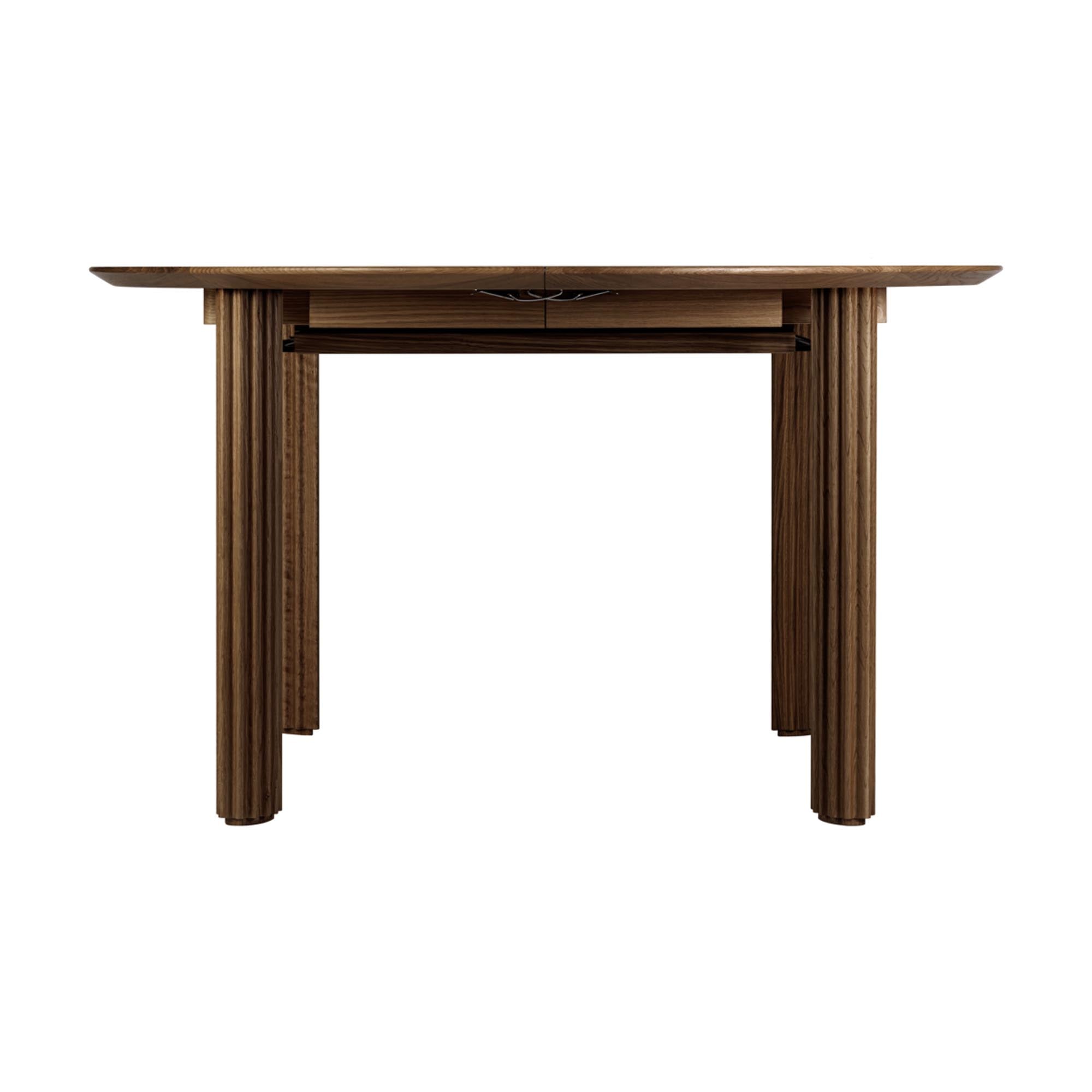 Stilvoller Umage Comfort Circle Tisch, erweiterbar für grosse Feiern.