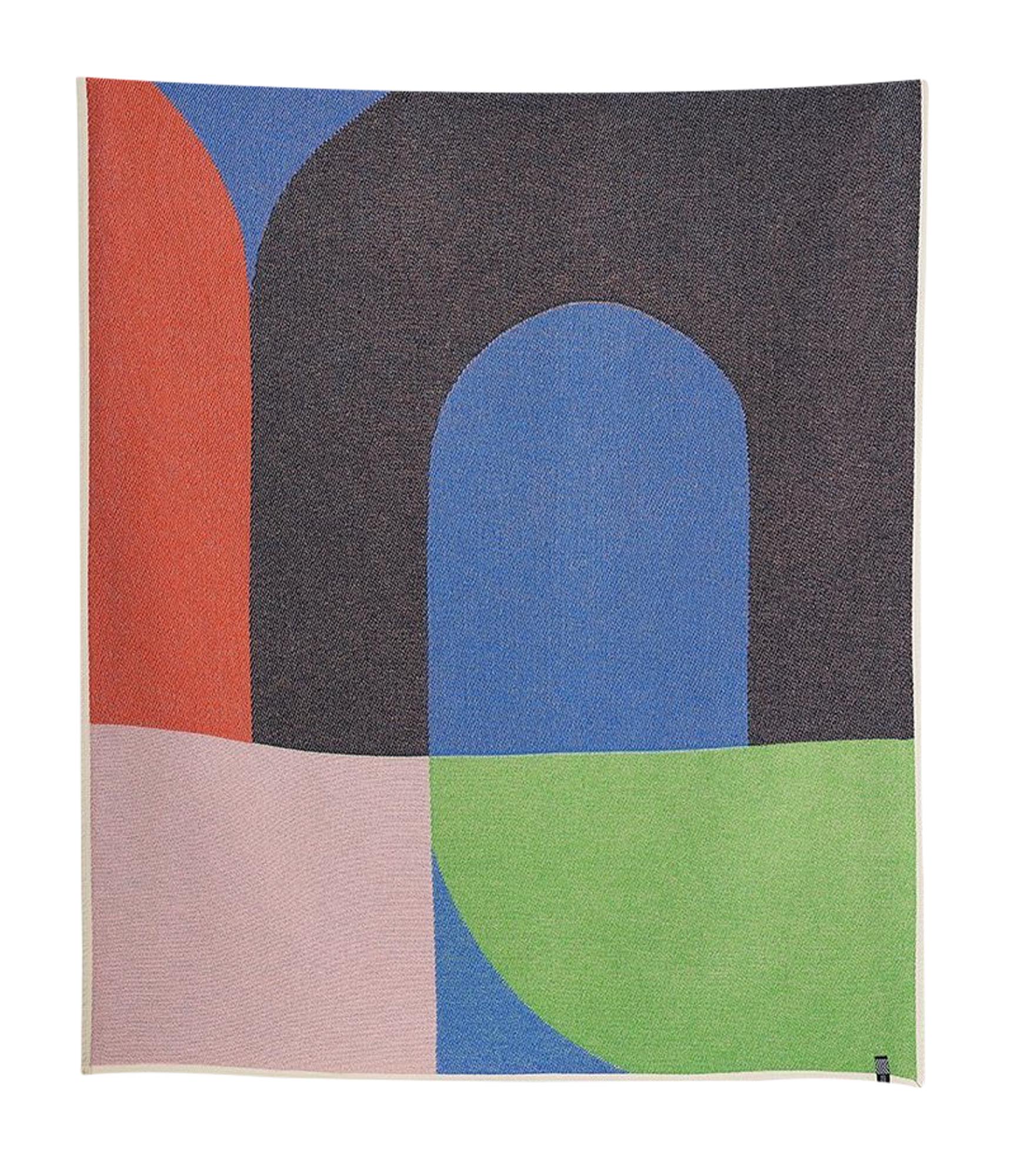 Exklusive ZigZagZurich Baumwolldecke für moderne Wohnambiente.