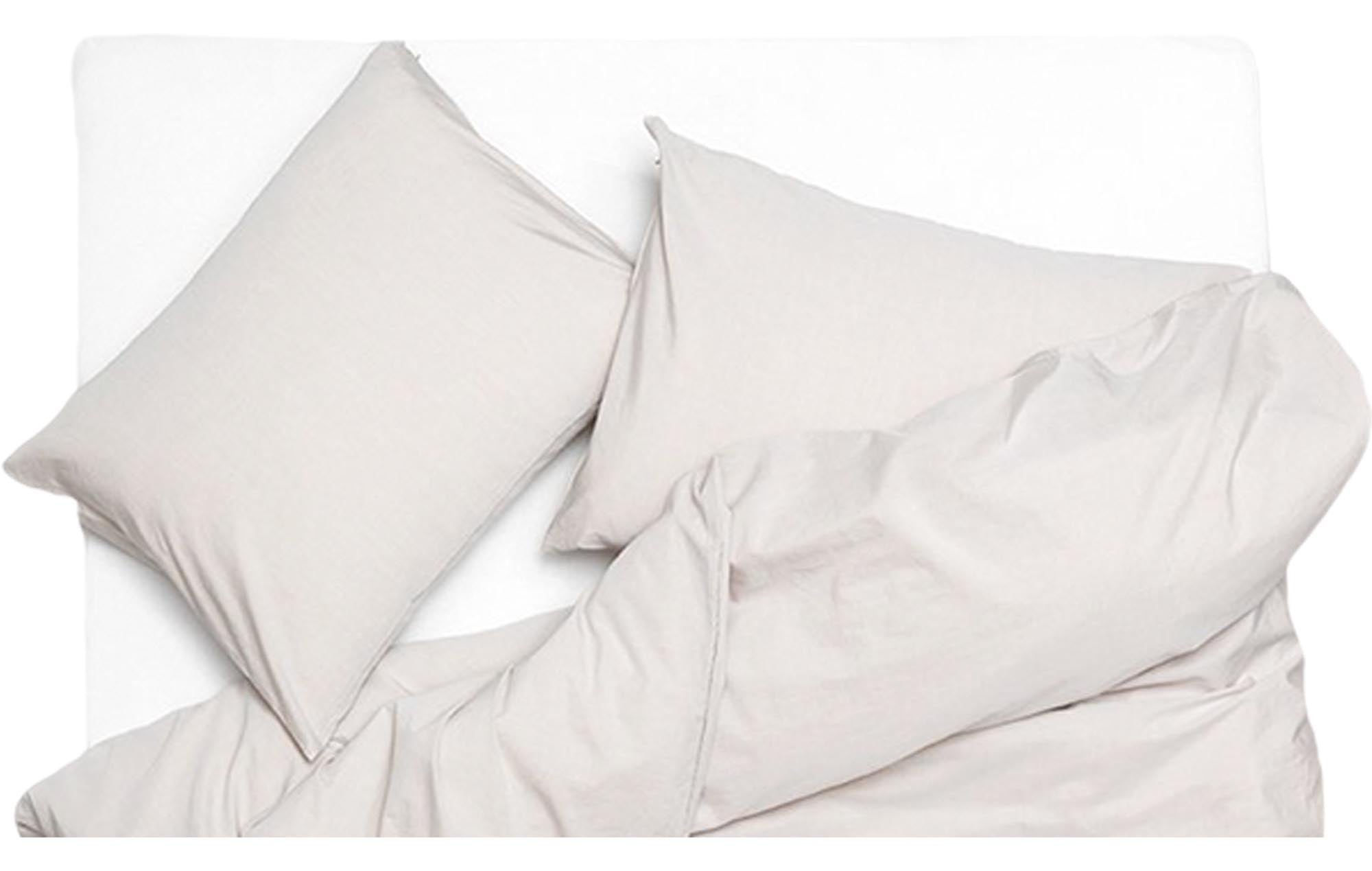 ZigZagZurich: Eleganter Vintage-Kissenbezug für zeitlose Räume.