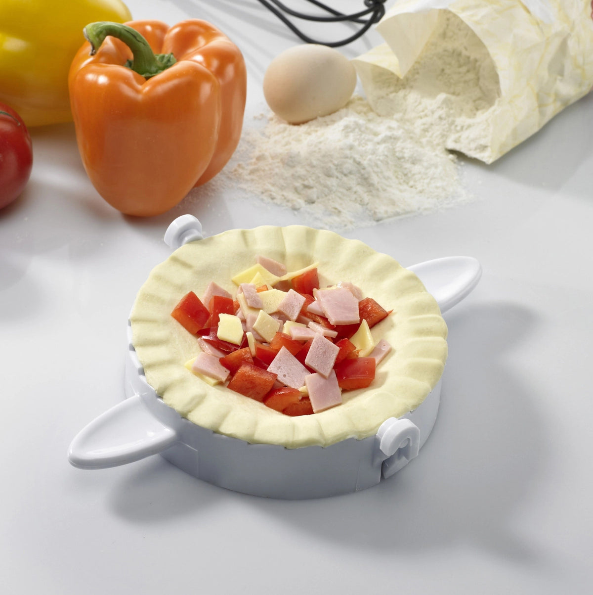 3-tlg. Set Maultaschen-/Ravioliformer in drei Grössen in Weiss präsentiert im Onlineshop von KAQTU Design AG. Backform / Backblech ist von Westmark