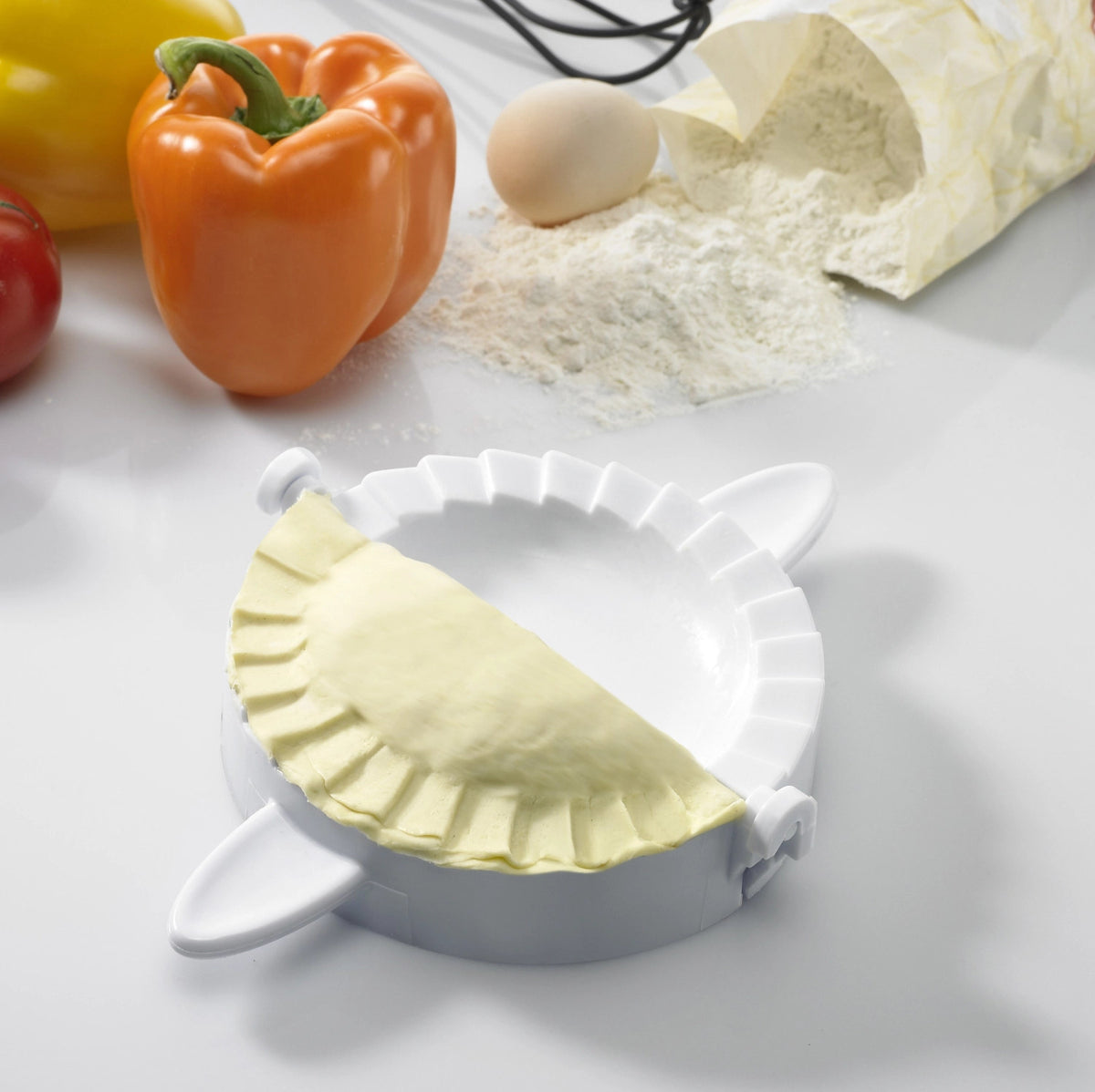 3-tlg. Set Maultaschen-/Ravioliformer in drei Grössen in Weiss präsentiert im Onlineshop von KAQTU Design AG. Backform / Backblech ist von Westmark