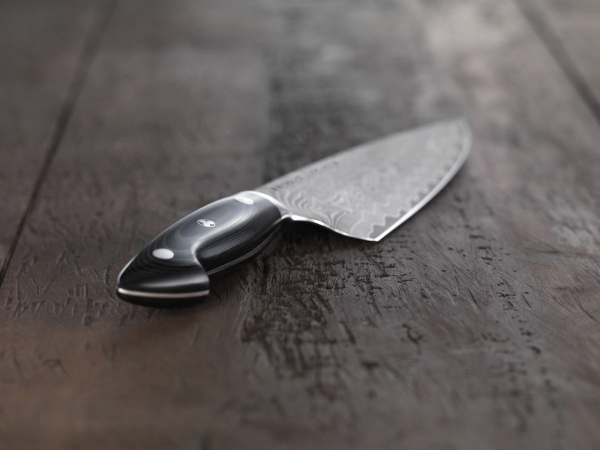 Kramer Euro Stainless Fleischmesser 23cm in Schwarz präsentiert im Onlineshop von KAQTU Design AG. Küchenmesser ist von Zwilling