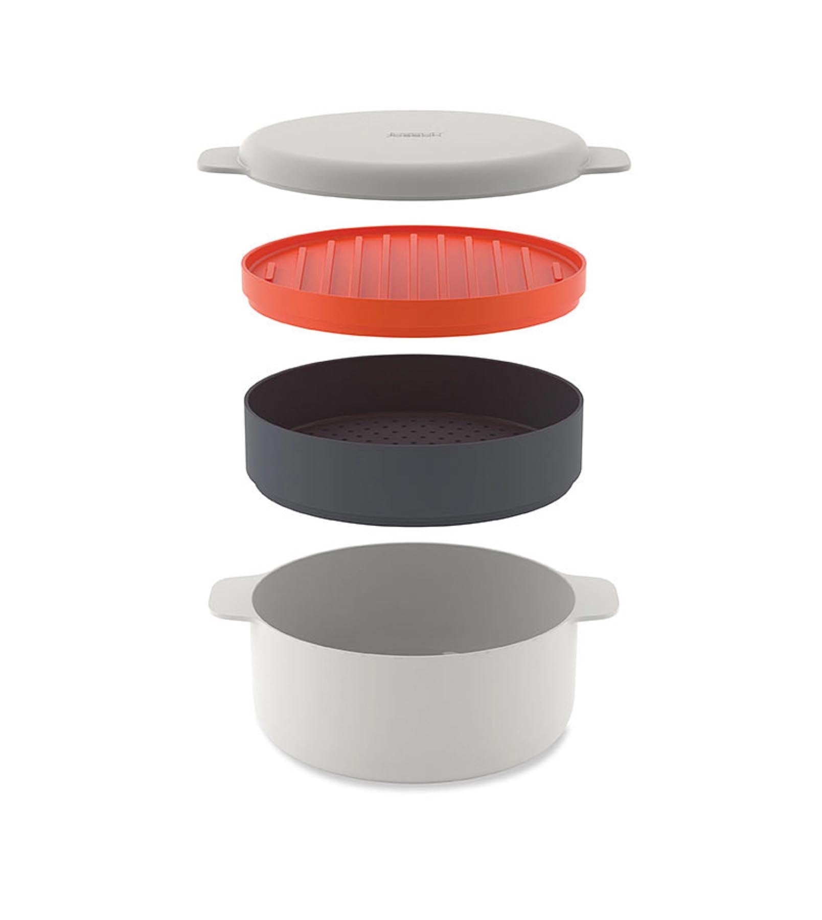 Praktisches 4er Set Mikrowellenkocher in modernem Grau und lebhaftem Orange von Joseph Joseph, ideal für die einfache und schnelle Zubereitung von Gerichten.