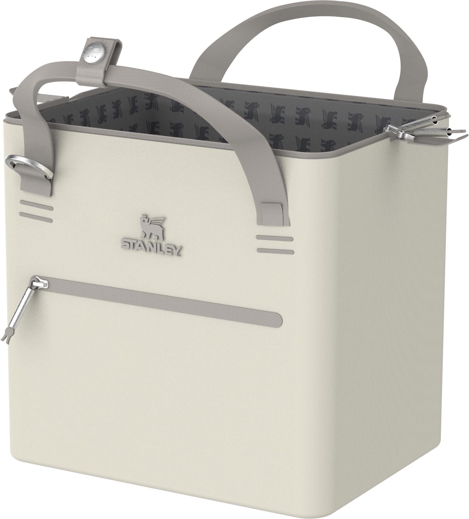 Praktische und elegante Kühltasche in zartem Creme von Stanley, perfekt für Picknicks und Tagesausflüge, mit 7 Litern Stauraum für Snacks und Getränke.