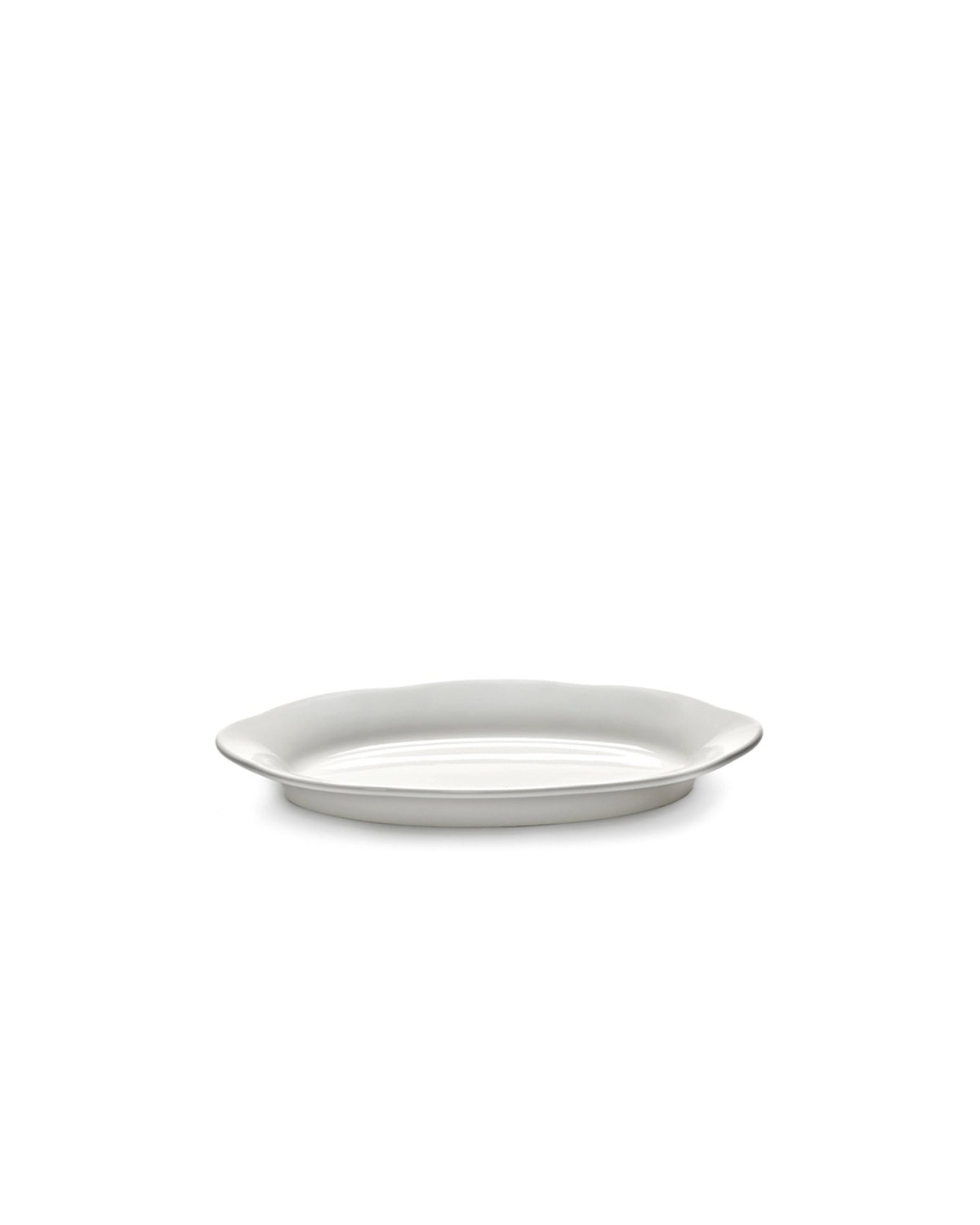 Weisser ovaler Porzellanteller von Serax mit tiefer Form, schlichtes Design für den gedeckten Tisch, Grösse 16.6x7.4cm.
