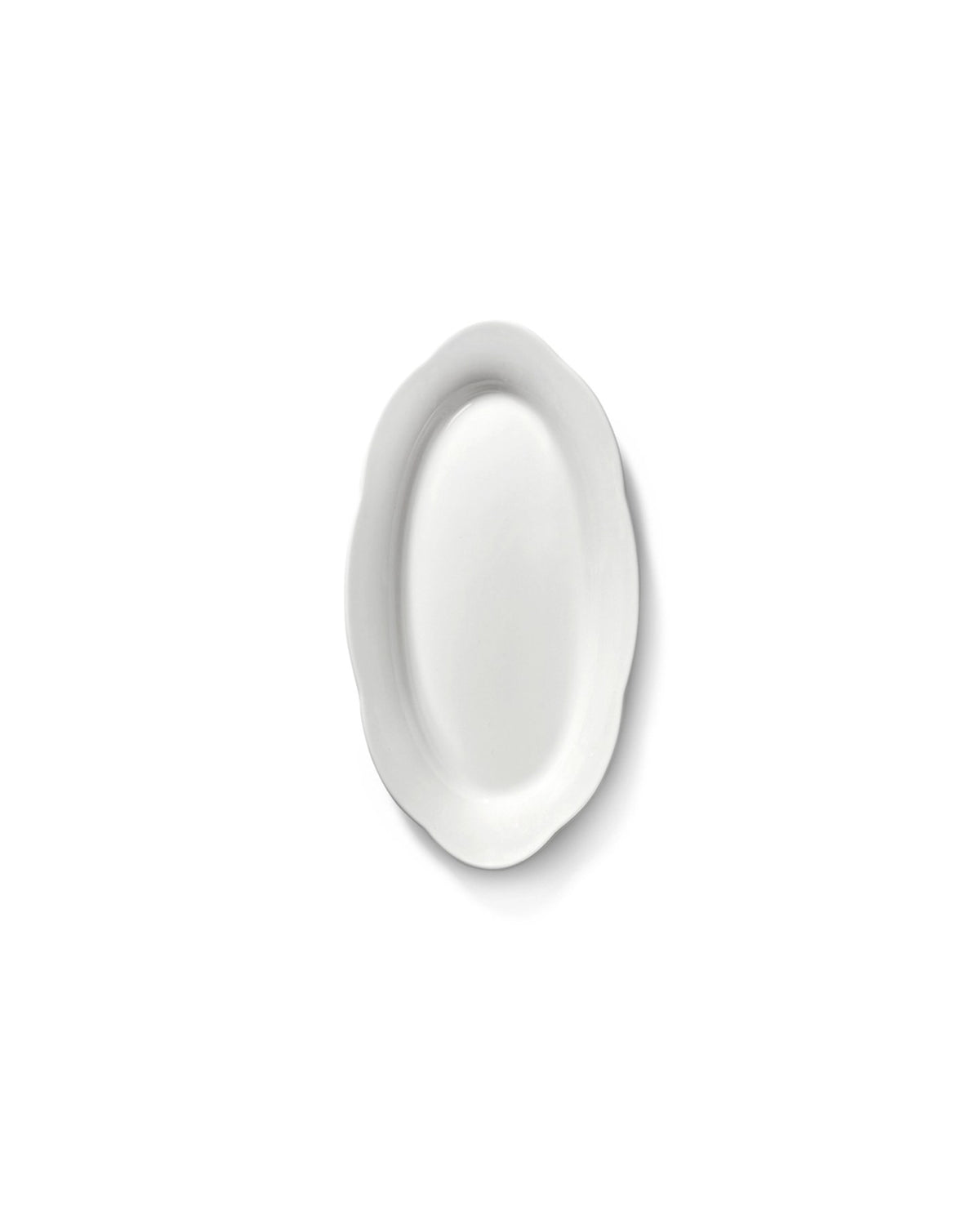 Weisser ovaler Porzellanteller von Serax mit tiefer Form, schlichtes Design für den gedeckten Tisch, Grösse 16.6x7.4cm.