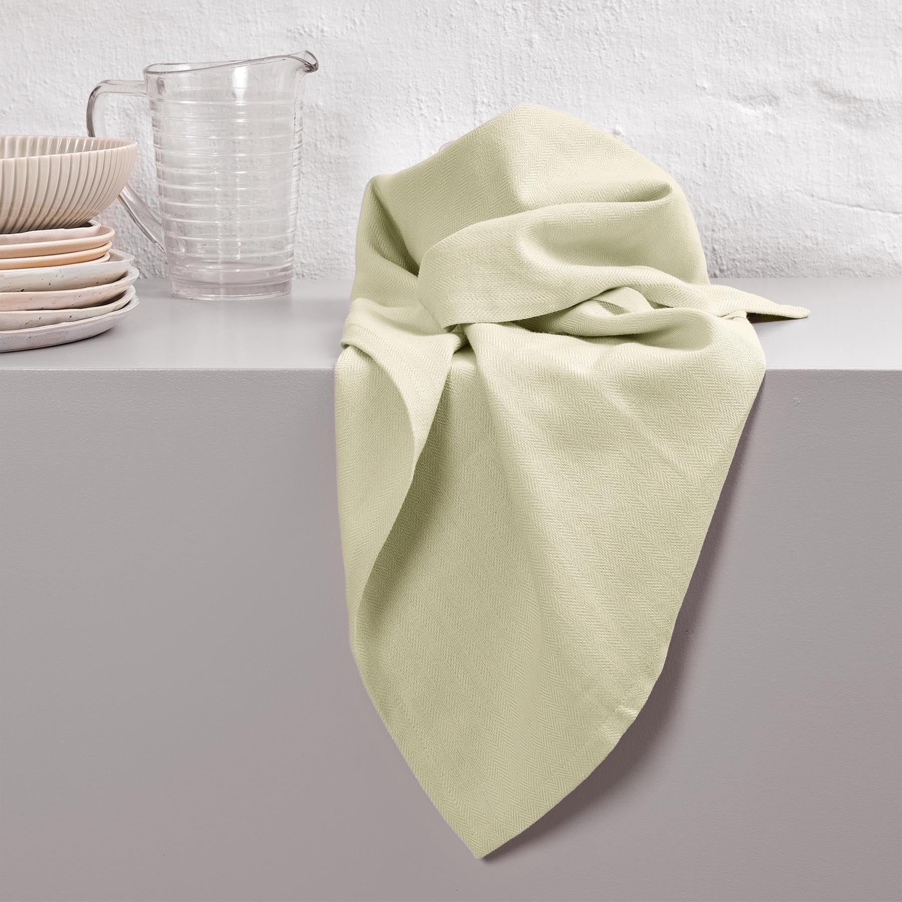 Elegantes Geschirrtuch in sanftem Honigbeige, gefertigt aus hochwertiger Biobaumwolle, ideal für stilvolle Küchen. Von The Organic Company.