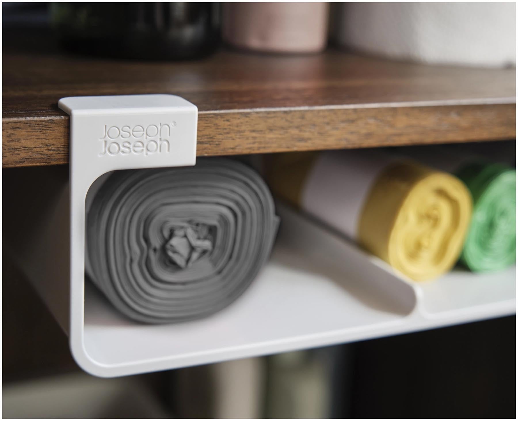 Stylischer Küchenorganizer von Joseph Joseph in Grau, ideal zur praktischen Aufbewahrung von Recyclingbeuteln. Funktional und platzsparend.