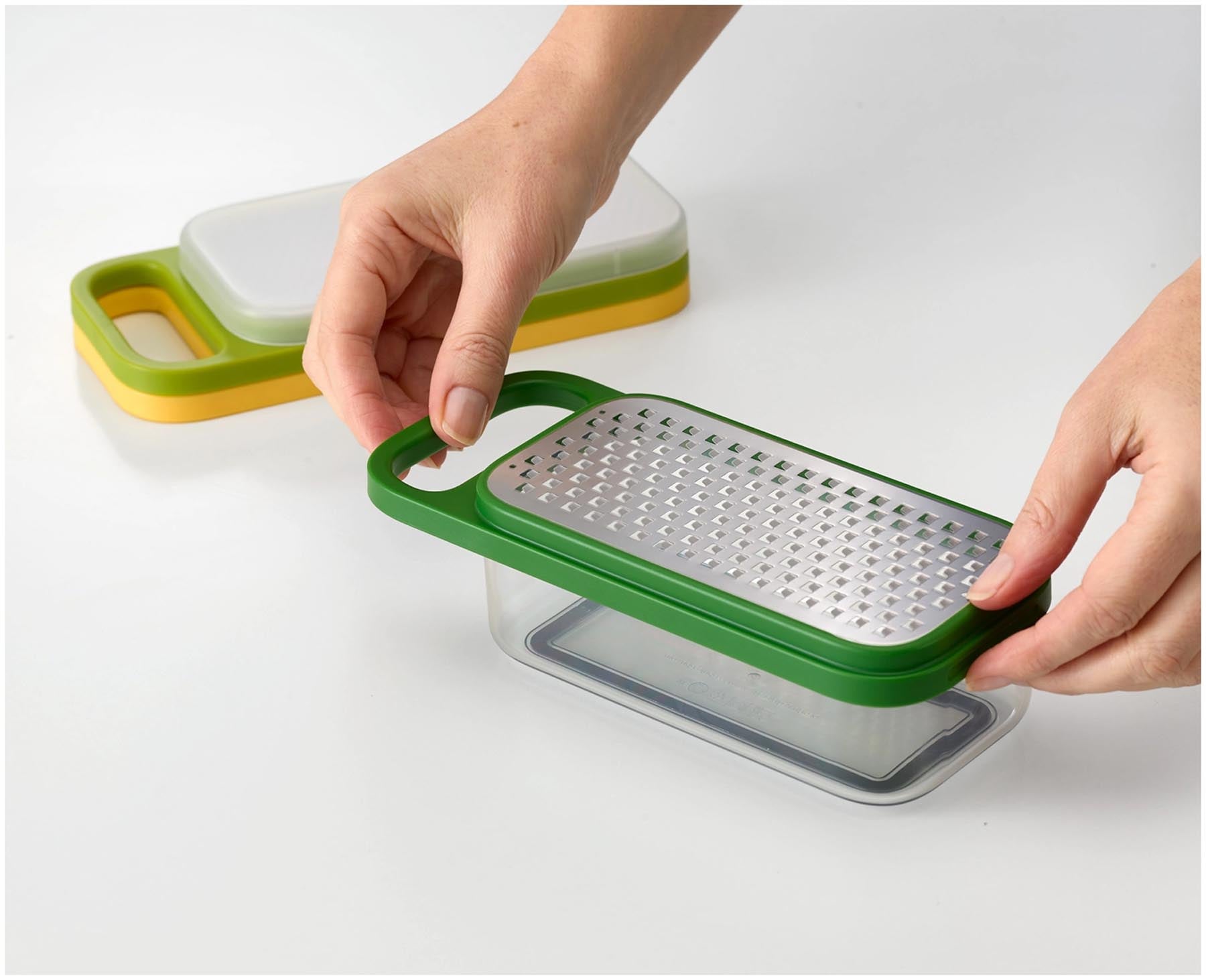 Praktisches Multi-Grate & Store Reibenset von Joseph Joseph in stilvollem Design, perfekt für die einfache Zubereitung und Lagerung von Zutaten.