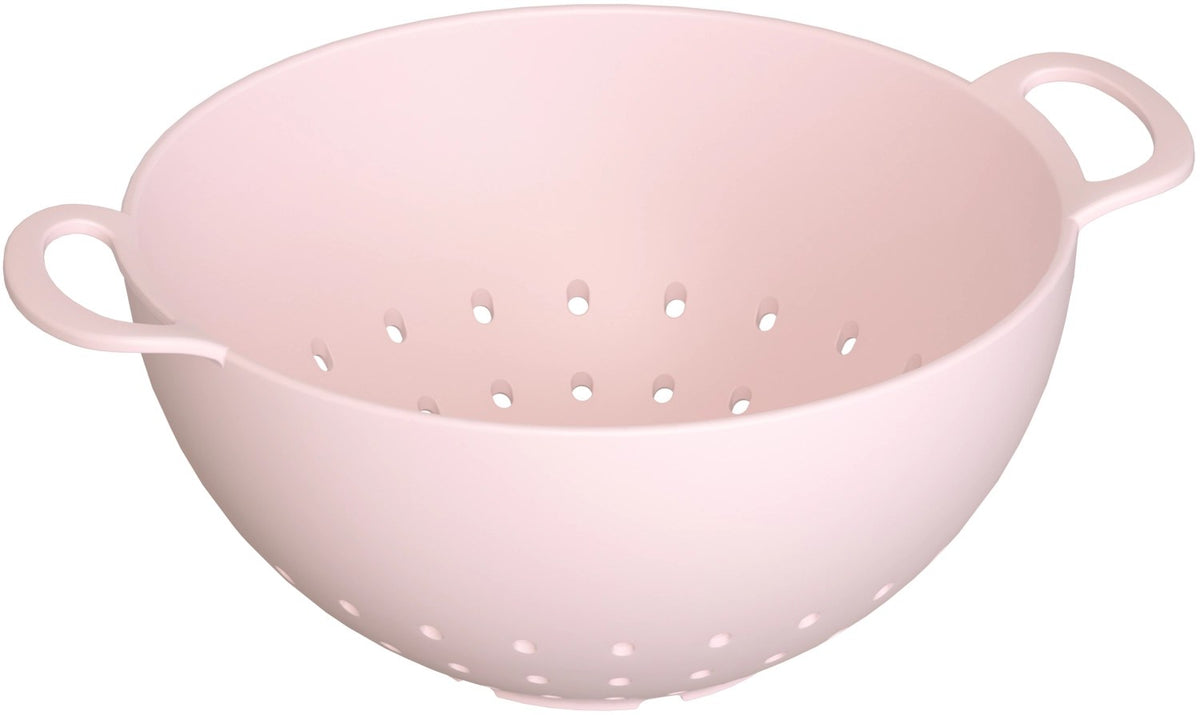 Pinkfarbenes Salatsieb aus Biopolymer, rund geformt mit Standfuss und Griffen, Grösse 30x30x12cm, Marke MAGU.