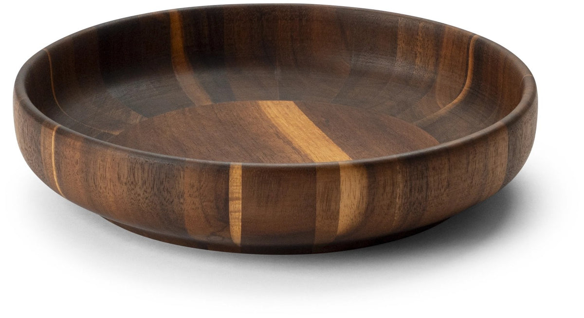 Braune Schale aus Akazienholz, 25 cm Durchmesser und 5.5 cm hoch, mit geschwungenen Seitenwänden und schmalem Fuss.