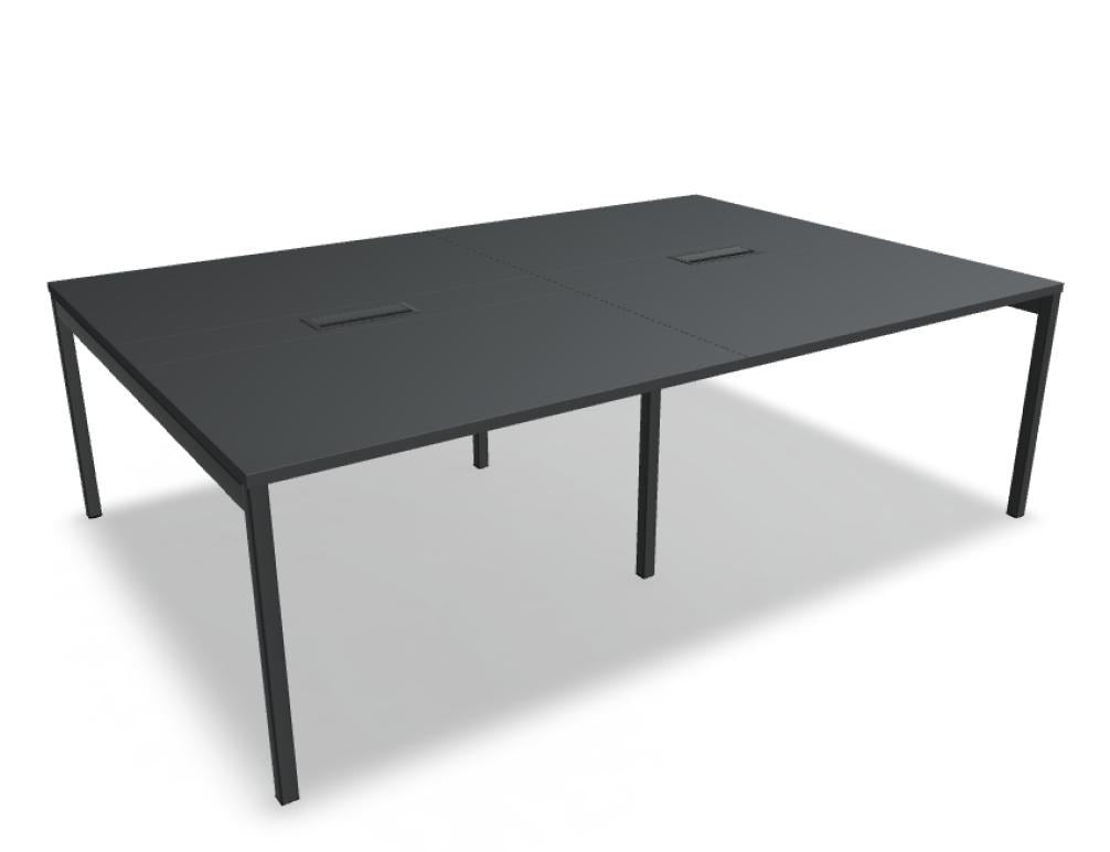 Esstisch Ogi Y von Mdd mit rechteckiger Tischplatte in Honigeiche, schwarzem Platteneinsatz und Metallgestell in Schwarz.