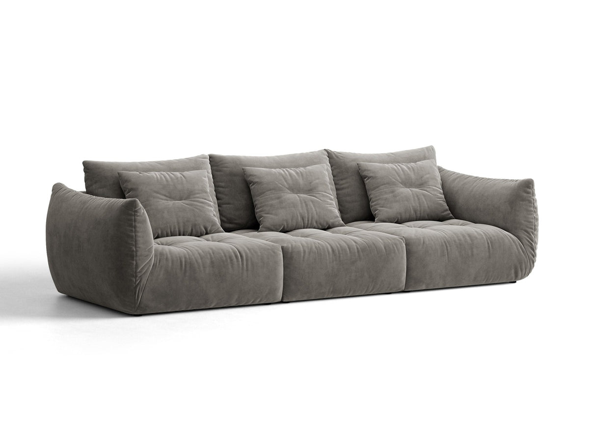 Modulares 4er Sofa Bloom von Micadoni in leichtem Beige, Bezug aus Casino-Velours, schwarze Kunststoffbeine, gepolsterte Rückenkissen.