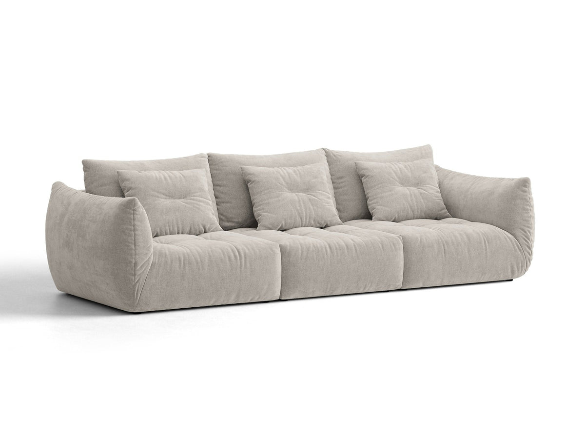 Modulares 4er Sofa Bloom von Micadoni in leichtem Beige, Bezug aus Casino-Velours, schwarze Kunststoffbeine, gepolsterte Rückenkissen.