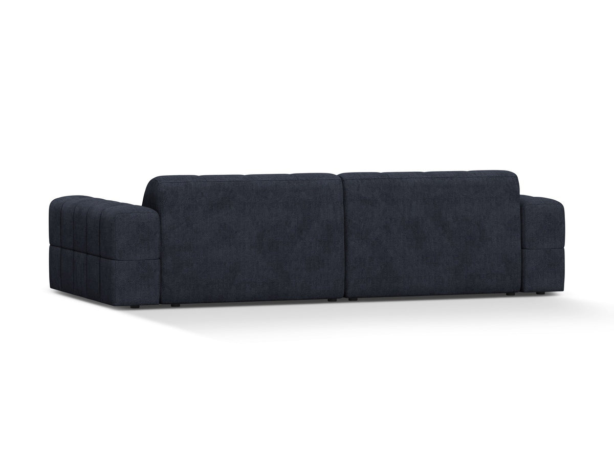 Beigefarbenes 4er Sofa Jennifer von Micadoni mit Samt-ähnlichem Bluvel-Stoff, schwarzen Kunststoffbeinen und gerader Rückenlehne.