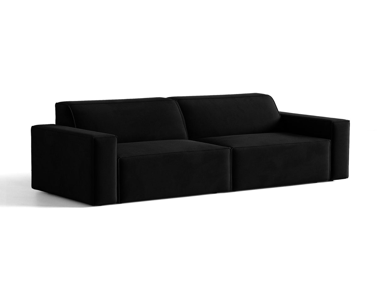 Modulares 4er Sofa Jodie von Micadoni in leichtem Beige mit Venus Samtstoff, schwarzen Kunststoffbeinen und niedriger Rückenlehne.