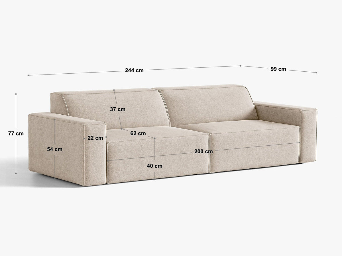 Modulares 4er Sofa Jodie von Micadoni in leichtem Beige mit Venus Samtstoff, schwarzen Kunststoffbeinen und niedriger Rückenlehne.