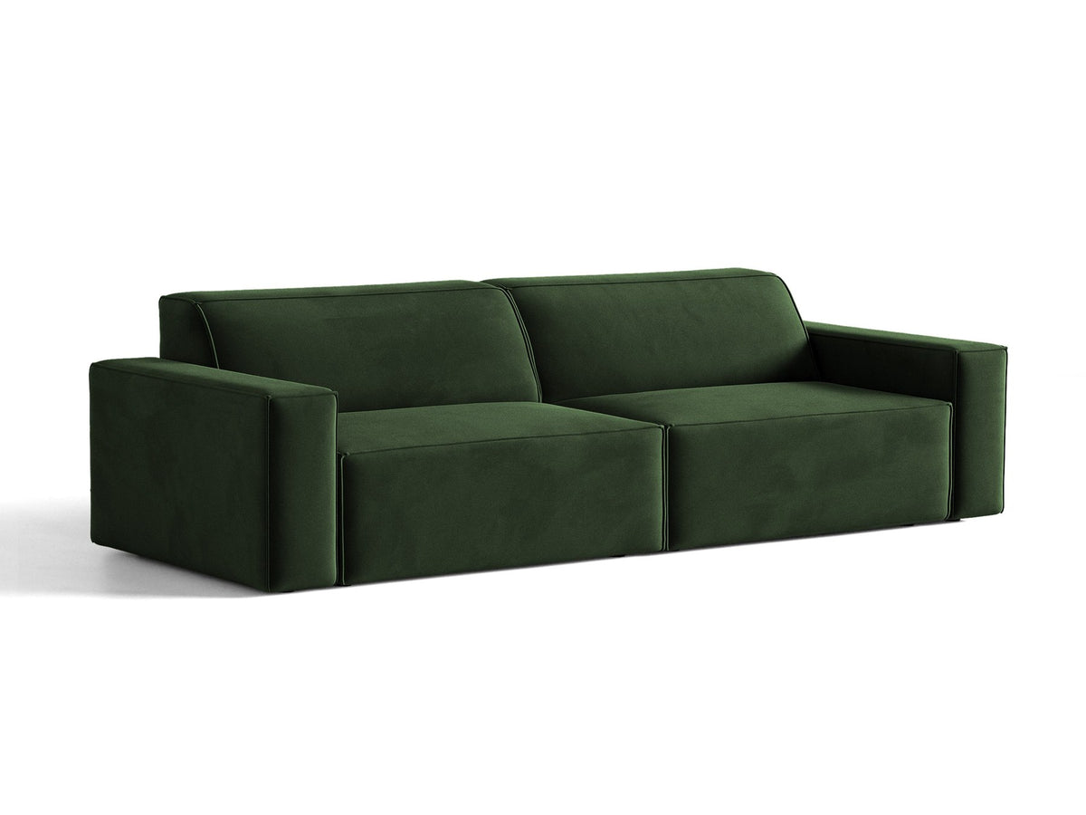 Modulares 4er Sofa Jodie von Micadoni in leichtem Beige mit Venus Samtstoff, schwarzen Kunststoffbeinen und niedriger Rückenlehne.