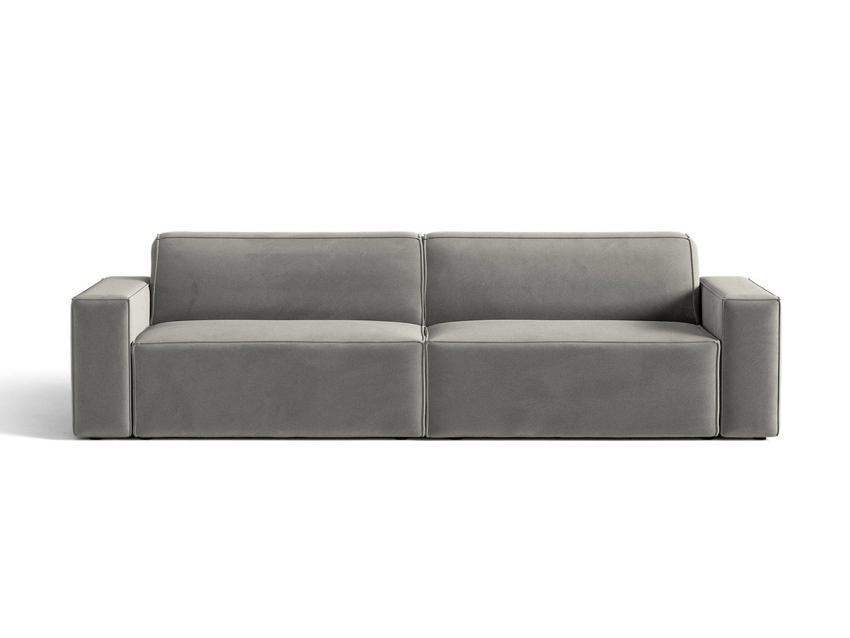 Modulares 4er Sofa Jodie von Micadoni in leichtem Beige mit Venus Samtstoff, schwarzen Kunststoffbeinen und niedriger Rückenlehne.