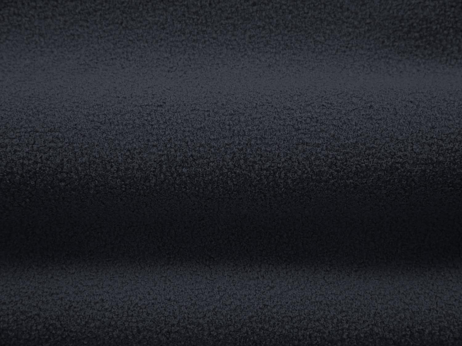 Moderner Boucle Armchair von Micadoni in tiefem Blau, perfekt für entspannte Stunden und stilvolle Akzente in jedem Raum.