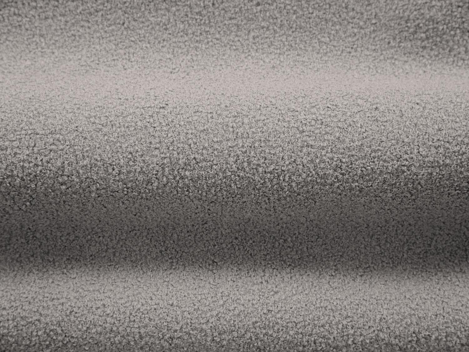 Erleben Sie den Chuck Swivel Boucle Armchair 1 Sitzer von Micadoni – eleganter Drehstuhl aus luxuriösem Boucle, ideal für Ihr modernes Zuhause.