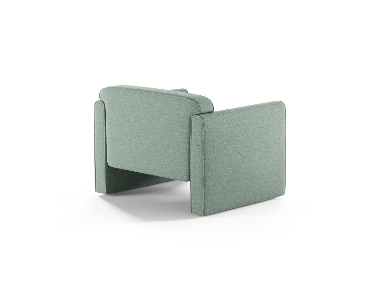 Beige Armsessel Abby von Micadoni mit strukturiertem Heritage-Stoffbezug, schwarzen Kunststoffbeinen und runder, kompakter Formgebung.