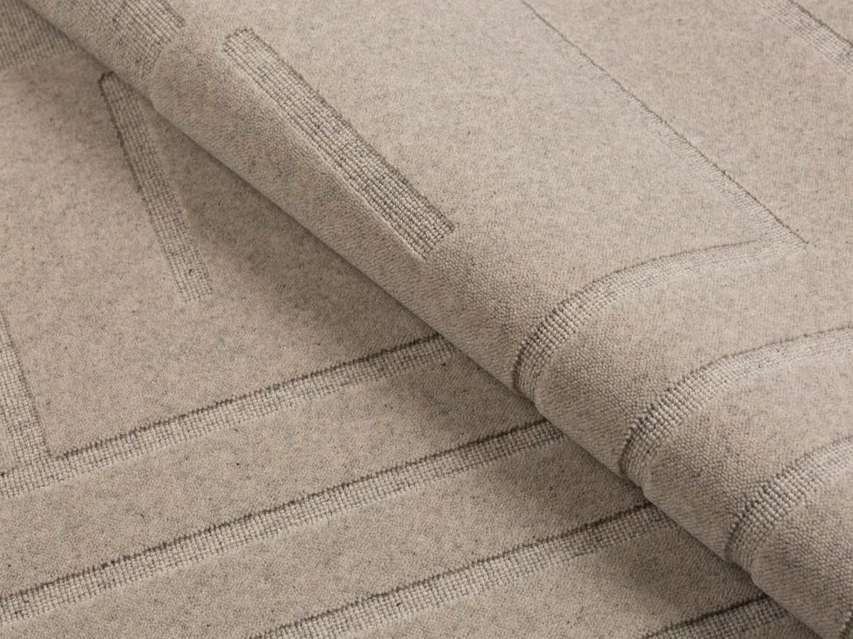 Hellgrauer Teppich Kasai von Micadoni aus Wolle, Grösse 230x160 cm, mit dichtem Flor und sauber verarbeiteten Kanten.