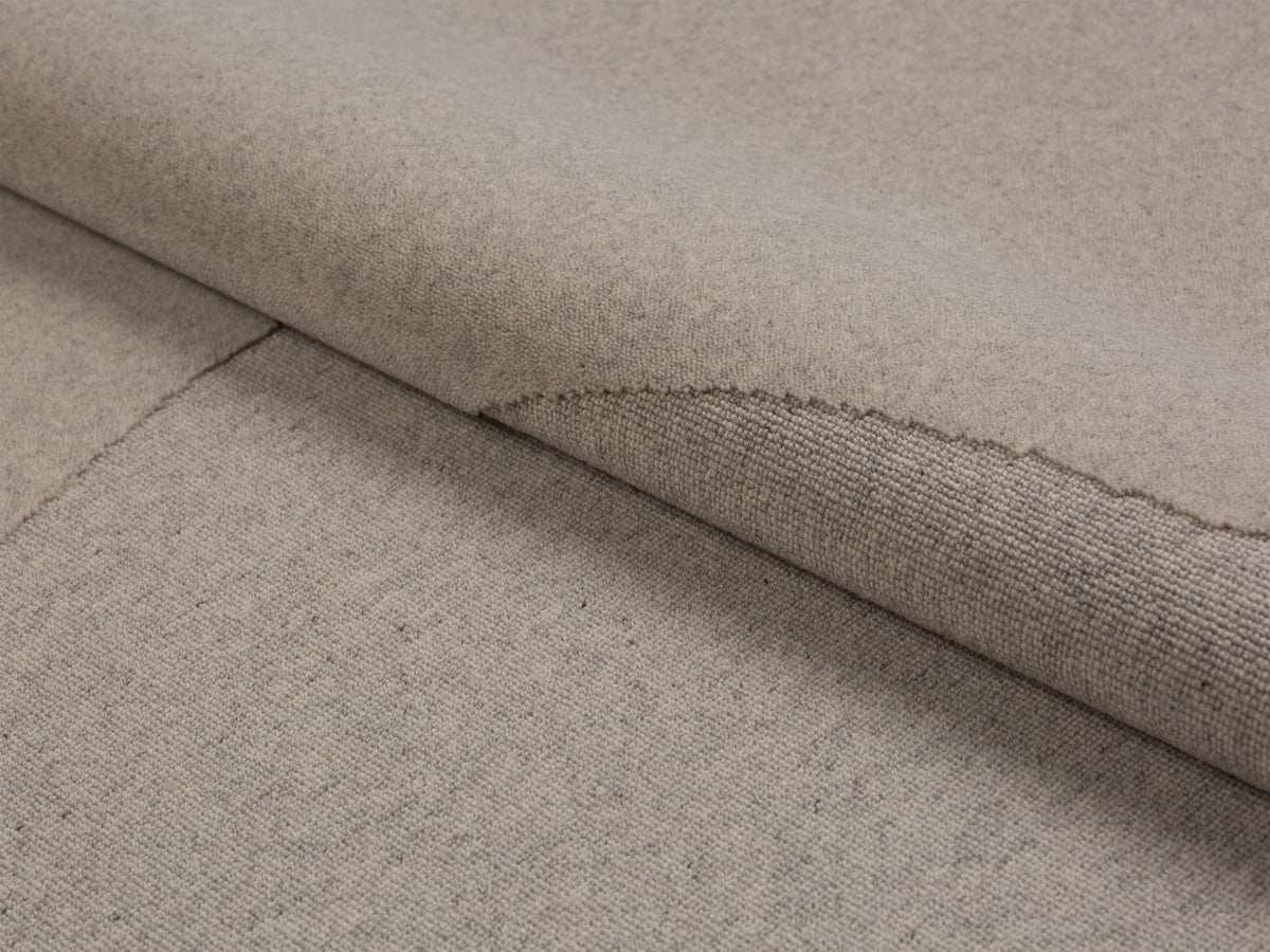 Hellgrauer Teppich Abstract von Micadoni aus Schurwolle, rechteckige Form, Masse 300x200cm, dichte Florstruktur mit sauberer Kantenverarbeitung.