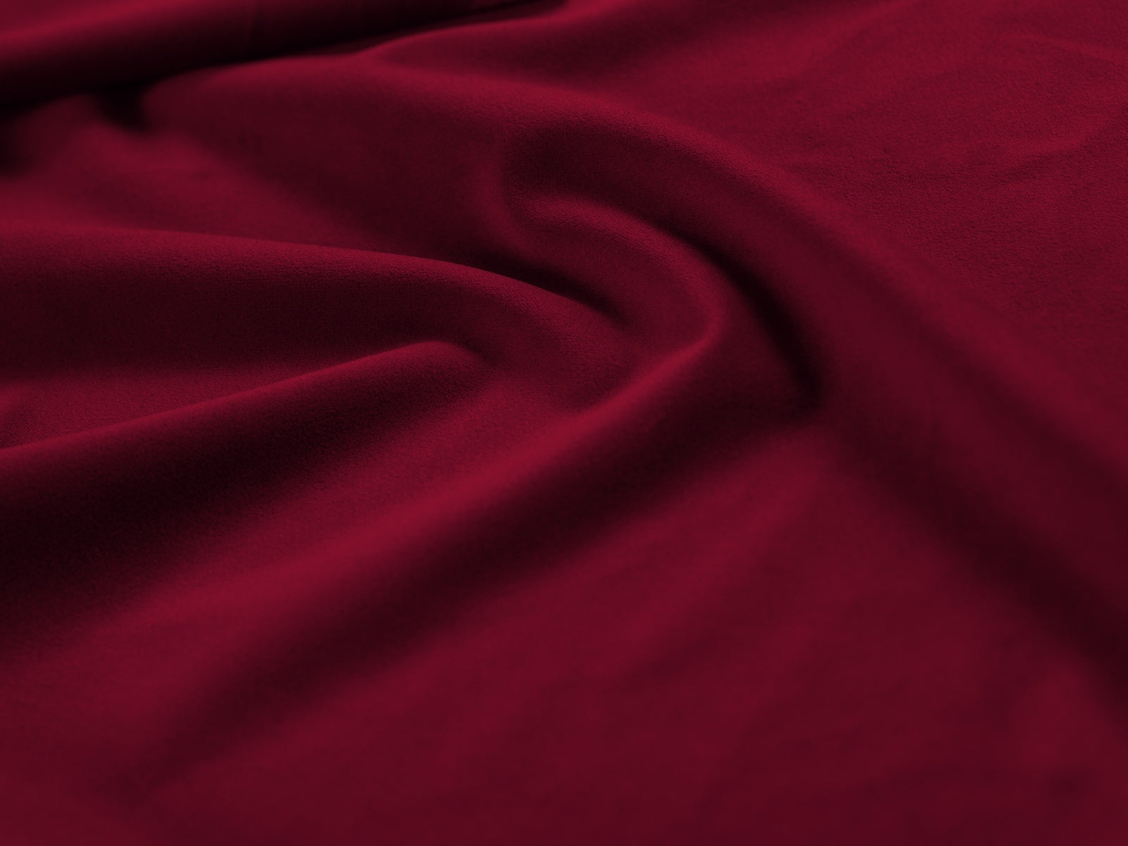Stylisches Mamaia Velour Ecksofa in Rot und Schwarz, perfekt für entspannte Stunden und zeitgemäße Einrichtungsideen.