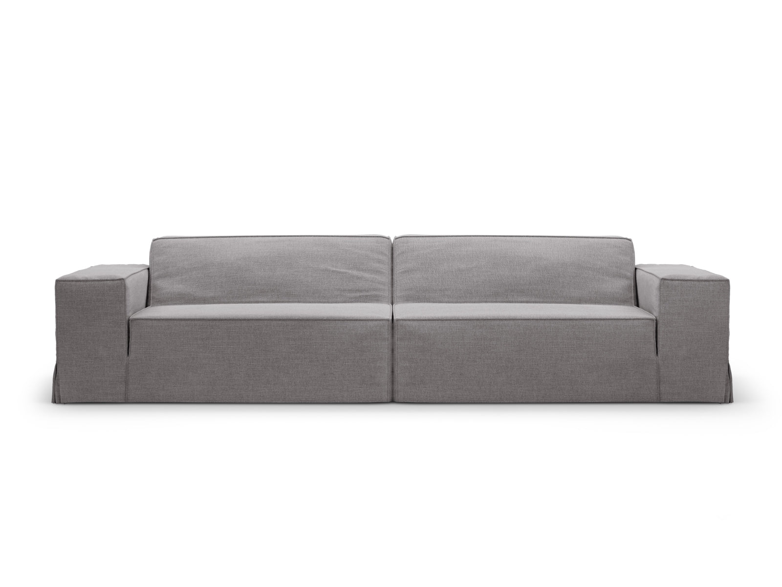 Elegantes Jodie Sofa Cover in sanftem Grau, idealer Schutz für Ihr Sofa und stilvolle Akzentuierung für Ihr Wohnambiente.
