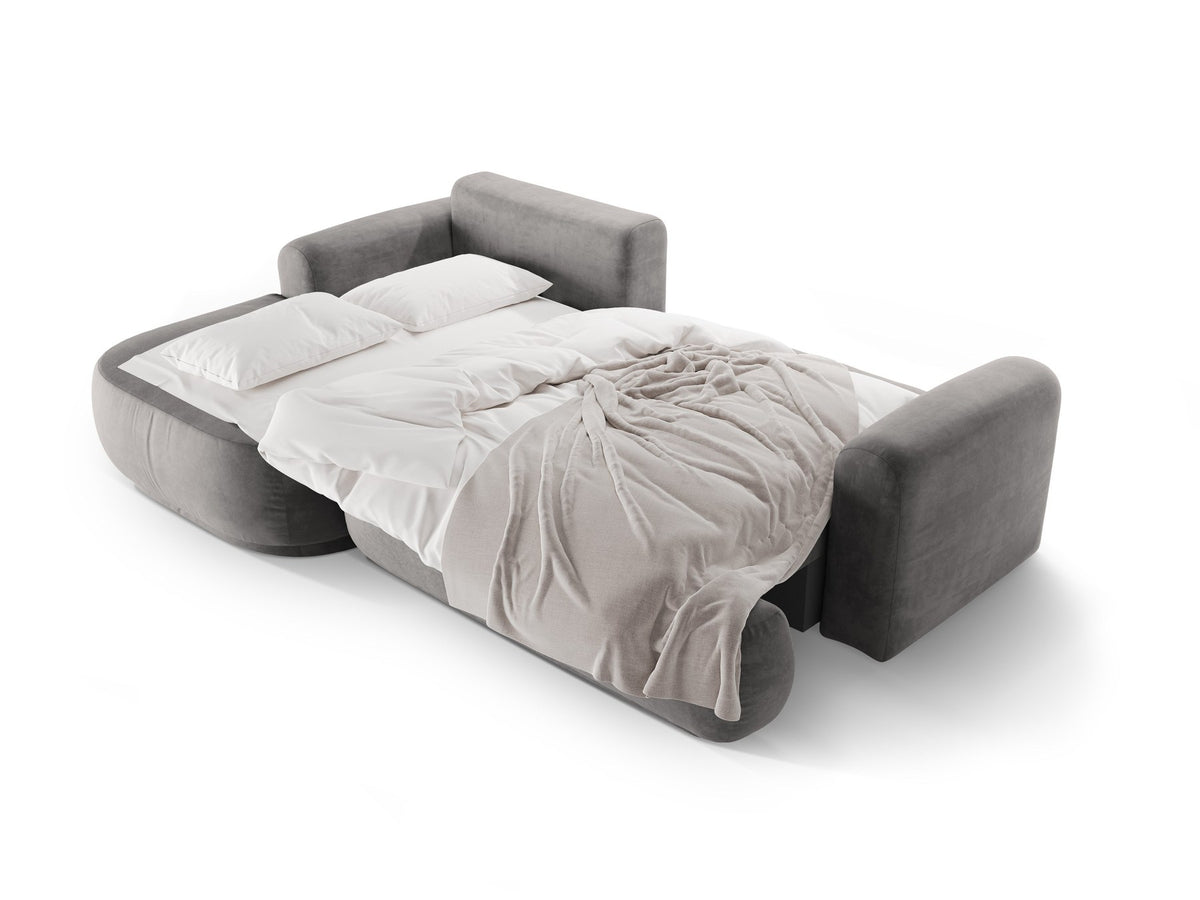 Ecksofa Ella von Micadoni in Leichtes Beige mit Veloursstoff-Bezug, schwarzen Kunststoffbeinen und ausklappbarer Liegefläche links, Retro-Form.