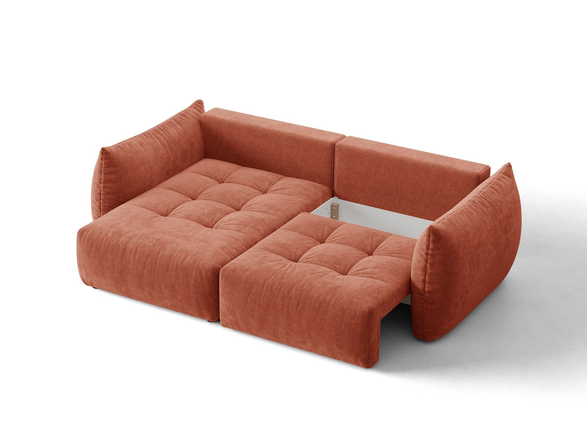 Ecksofa Bloom in Sand mit Velours-Bezug, schwarzen Kunststoffbeinen und ausklappbarer Schlaffunktion samt Bettkasten unter der Sitzfläche.