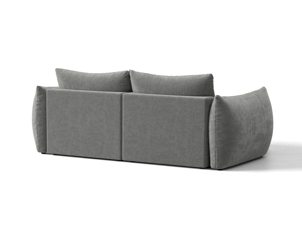 Ecksofa Bloom in Sand mit Velours-Bezug, schwarzen Kunststoffbeinen und ausklappbarer Schlaffunktion samt Bettkasten unter der Sitzfläche.