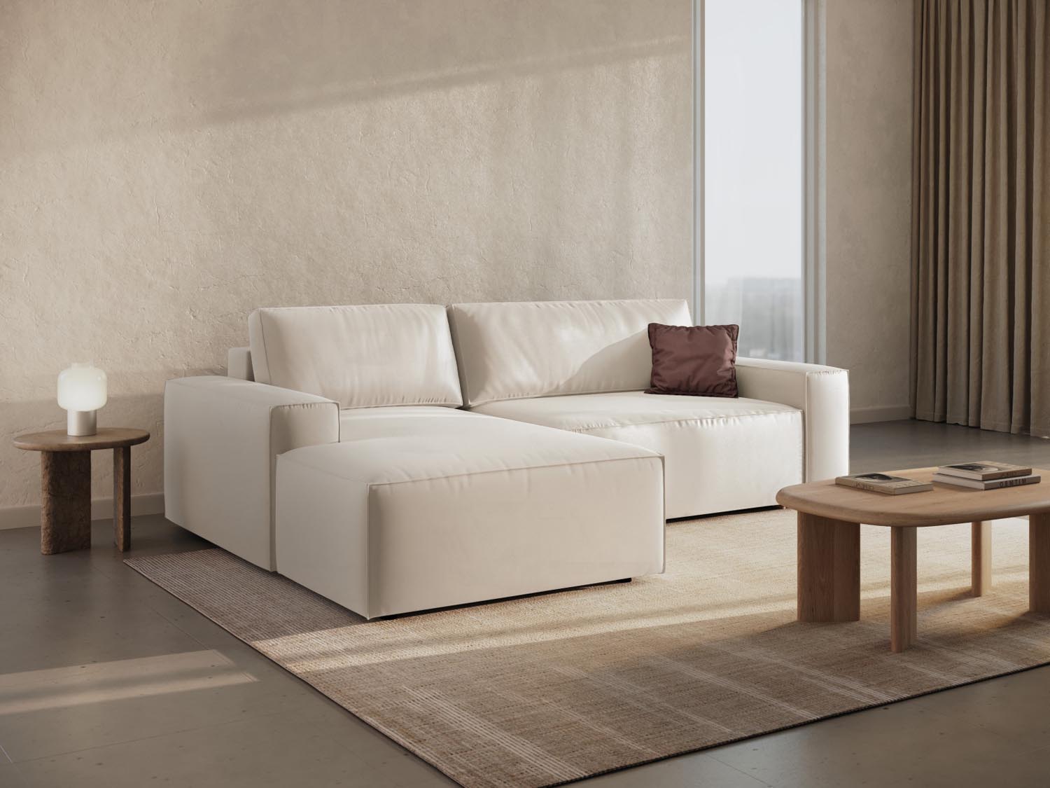Elegantes Jodie Velour Ecksofa in Light Beige-Bluvel, ideal für stilvolle Wohnräume, mit praktischer Schlaffunktion und Stauraum.
