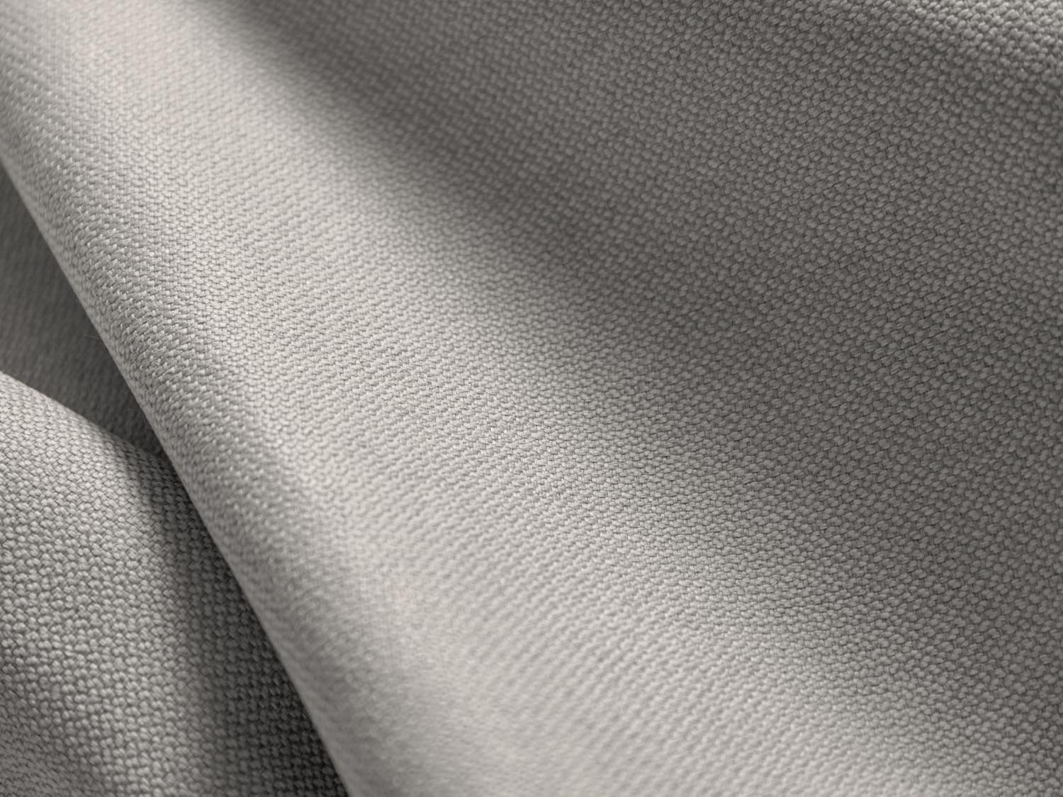 Modernes Jodie Ecksofa links in elegantem Grau, ideal für Gästeübernachtungen und mit nützlichem Stauraum für Kissen und Decken.