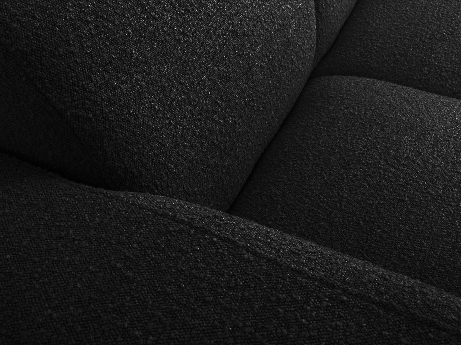 Molino Boucle Ecksofa links 4 Sitzer in Black-Baloo präsentiert im Onlineshop von KAQTU Design AG. L-Sofa links ist von Micadoni