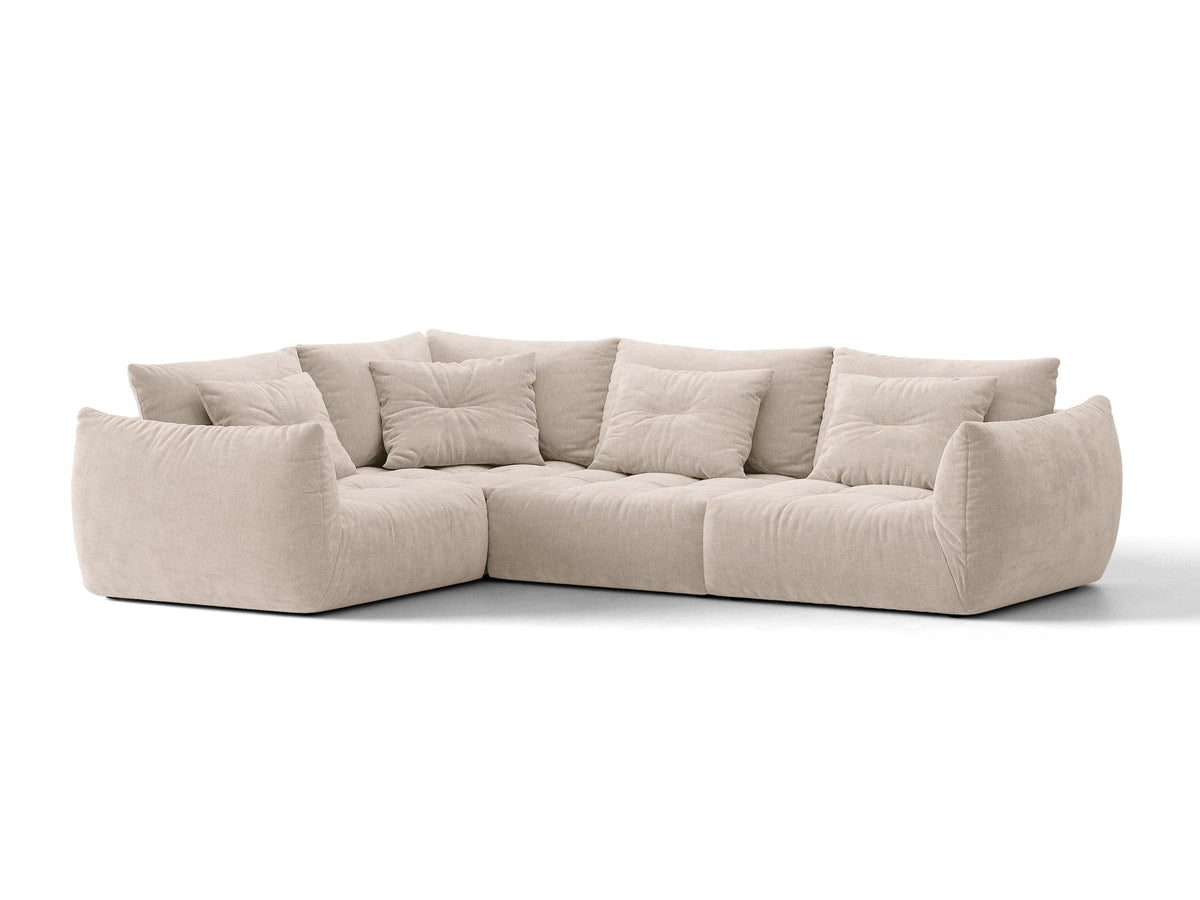 Modulares Ecksofa links Bloom von Micadoni in leichtem Beige, Veloursstoff Casino Pearl, schwarze Kunststoffbeine, tiefe Sitzfläche.